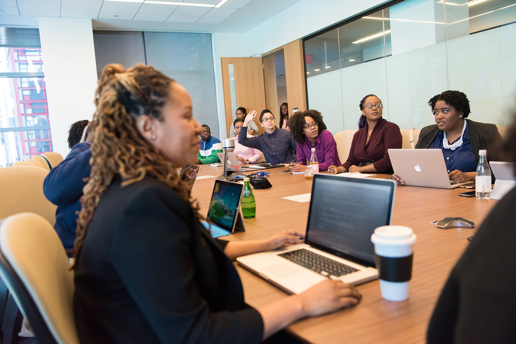 A group of women meeting in a business conference room