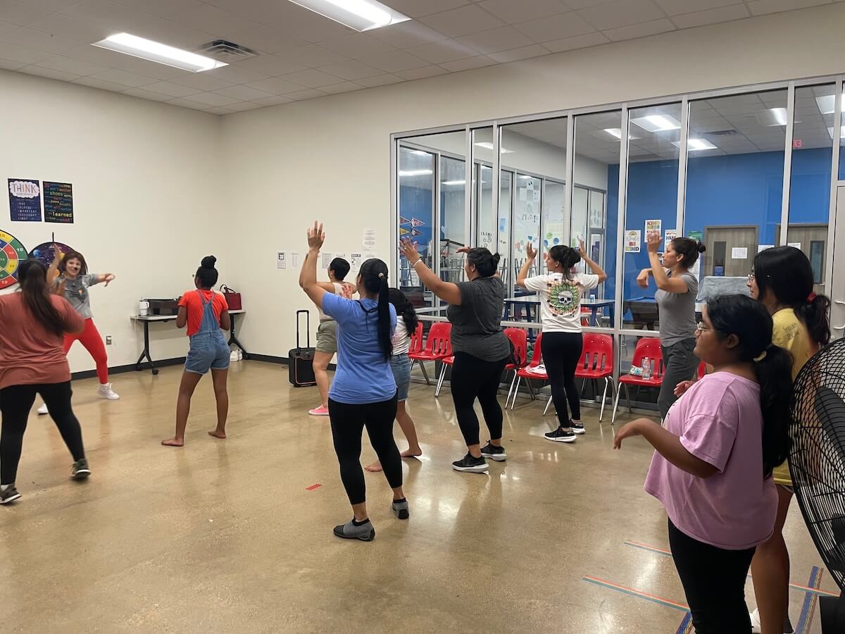 A group of people in a workout class